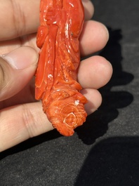 Two Chinese red coral figures of Shoulao on wooden stand, 19/20th C.