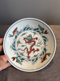 A Chinese doucai 'dragon and carps' plate, Chenghua mark, Yongzheng