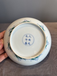A Chinese doucai 'dragon and carps' plate, Chenghua mark, Yongzheng
