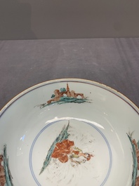 Two Dutch-decorated Chinese blue and white bowls with figures and landscapes, Qianlong