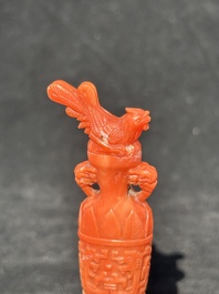 A Chinese carved red coral 'mythical animals' snuff bottle on stand, 19/20th C.