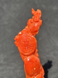 Two Chinese red coral figures of Shoulao on wooden stand, 19/20th C.