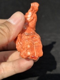 Two Chinese red coral figures of Shoulao on wooden stand, 19/20th C.