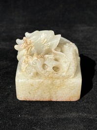 A Chinese white jade 'dragon' seal, Li Shiming 李世民 mark, Qing