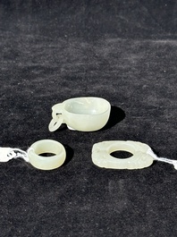 A Chinese white jade cup and two rings, Qing