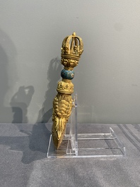 A Sino-Tibetan gilt copper and cloisonn&eacute; vajra kartika with inscriptions, 19/20th C.