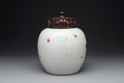 A Chinese famille rose 'Qi Lin Song Zi 麒麟送子' jar and wooden cover, Qianlong/Jiaqing