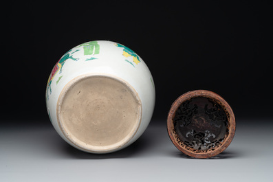 A Chinese famille rose 'Qi Lin Song Zi 麒麟送子' jar and wooden cover, Qianlong/Jiaqing