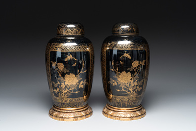 A pair of Chinese gilt-decorated mirror-black-glazed jars and covers on gilt bronze mounts, 19th C.
