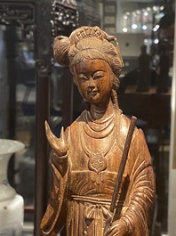 Eight Chinese hardwood figures of female deities, 19th C.