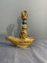 A Sino-Tibetan gilt copper and cloisonn&eacute; vajra kartika with inscriptions, 19/20th C.