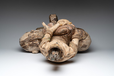 A large Chinese polychromed wooden Guanyin seated on an elephant, Republic