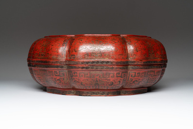 A Chinese red lacquer box and cover with floral design, 19/20th C.