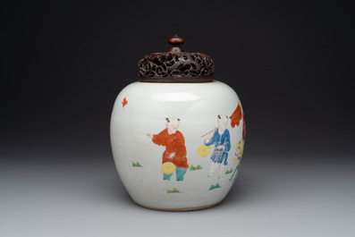 A Chinese famille rose 'Qi Lin Song Zi 麒麟送子' jar and wooden cover, Qianlong/Jiaqing