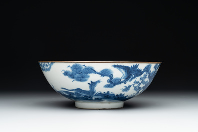 A Chinese blue and white 'Bleu de Hue' 'roosters and chick' plaque in a carved wooden screen and a bowl, 19th C.