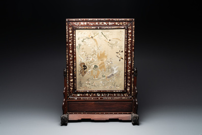 A Chinese mother-of-pearl-inlaid wooden table screen with silk embroidery, Canton, 19th C.