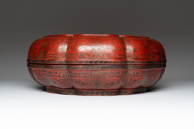 A Chinese red lacquer box and cover with floral design, 19/20th C.