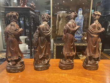 Eight Chinese hardwood figures of female deities, 19th C.