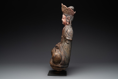 A Chinese polychromed wooden Buddha, 20th C.