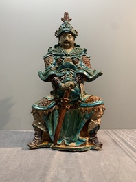 An impressive and fine Chinese sancai-glazed biscuit Guandi, Ming, 17th C.