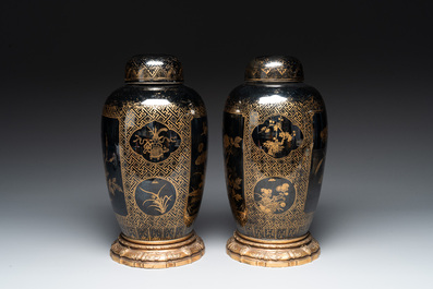 A pair of Chinese gilt-decorated mirror-black-glazed jars and covers on gilt bronze mounts, 19th C.