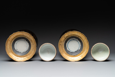 A pair of Chinese gilt-decorated mirror-black-glazed jars and covers on gilt bronze mounts, 19th C.