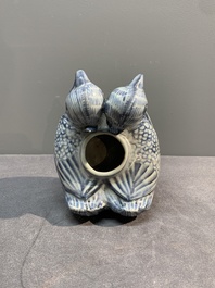 A Chinese blue and white 'double mandarin duck' ewer or water dropper on wooden stand, Ming, ca. 1500