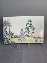 A pair of Chinese famille rose plaques with garden scenes, 19/20th C.