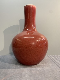 A Chinese copper-red-glazed bottle vase, 19th C.