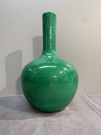 A Chinese apple-green-glazed and two copper-red-glazed bottle vases, Kangxi mark, 19/20th C.