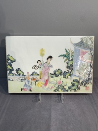 A pair of Chinese famille rose plaques with garden scenes, 19/20th C.
