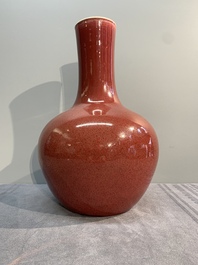 A Chinese copper-red-glazed bottle vase, 19th C.