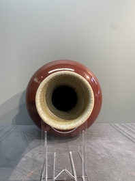 A Chinese copper-red-glazed bottle vase, 19th C.
