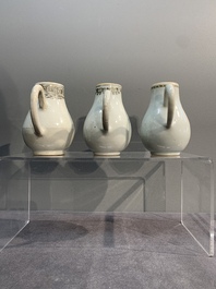 Three various Chinese gilt-decorated grisaille 'European subject' milk jugs, Qianlong