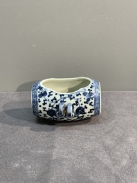 A Chinese blue and white tea caddy with wooden cover and a bird feeder, Xuande mark, 19th C.