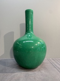 A Chinese apple-green-glazed and two copper-red-glazed bottle vases, Kangxi mark, 19/20th C.