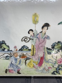 A pair of Chinese famille rose plaques with garden scenes, 19/20th C.