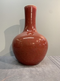 A Chinese copper-red-glazed bottle vase, 19th C.