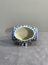 A Chinese blue and white tea caddy with wooden cover and a bird feeder, Xuande mark, 19th C.