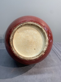 A Chinese copper-red-glazed bottle vase, 19th C.