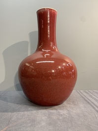 A Chinese copper-red-glazed bottle vase, 19th C.