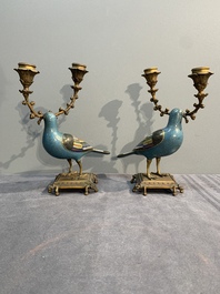 A pair of Chinese cloisonn&eacute; pigeons mounted as candelabras, 19th C.