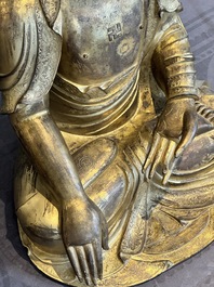 An impressive and large Chinese gilt bronze Buddha, Ming, 16th C.