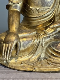 An impressive and large Chinese gilt bronze Buddha, Ming, 16th C.
