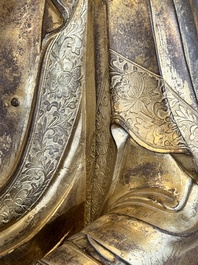An impressive and large Chinese gilt bronze Buddha, Ming, 16th C.