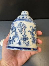 A Dutch Delft blue and white tea caddy with a pipe smoker, 18th C.