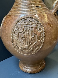 Two armorial stoneware jugs, Raeren, one dated 1586, 16/17th C.