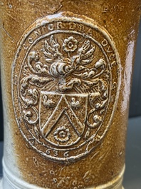 Two stoneware jugs with pewter lids, one with a coat of arms and dated 1636, Germany, 17th C.