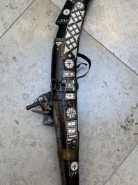 Three impressive flintlock muskets or 'moukahlas', two percussion pistols and three gunpowder horns, Morocco, 18/19th C.
