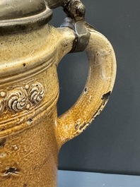 Two stoneware jugs with pewter lids, one with a coat of arms and dated 1636, Germany, 17th C.